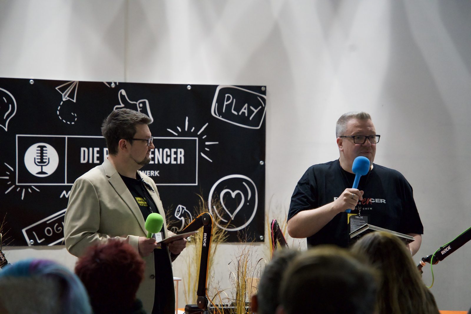 Moderation auf der Bühne beim Podfluencer Festival 2025
